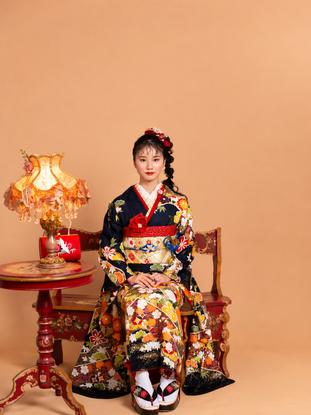 牡丹の花模様が咲き誇る黒の振袖